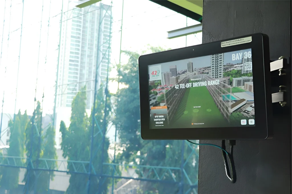 TrackMan technology radar screen displaying golf swing analysis parameters at 42 TEE-OFF